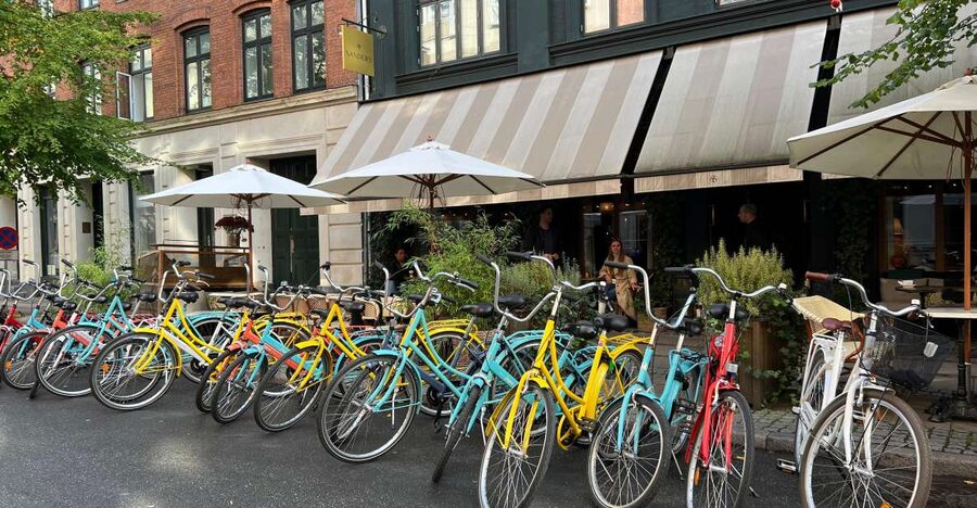 Copenhagen: City Highlights Guided Bike Tour - Nyhavn, colorful streets, and photo stops