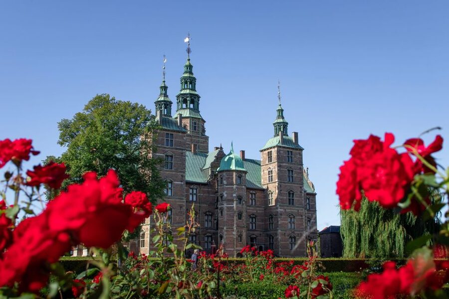 Copenhagen: Guided City Highlights Tour - Amagertorv shows the older city beneath the shopping streets