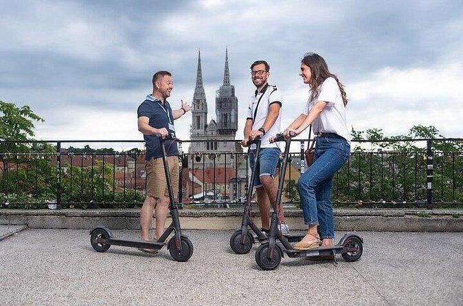 E-Scooter guided tours in Wonderful Copenhagen - Holmen brings the tour back to the harbor
