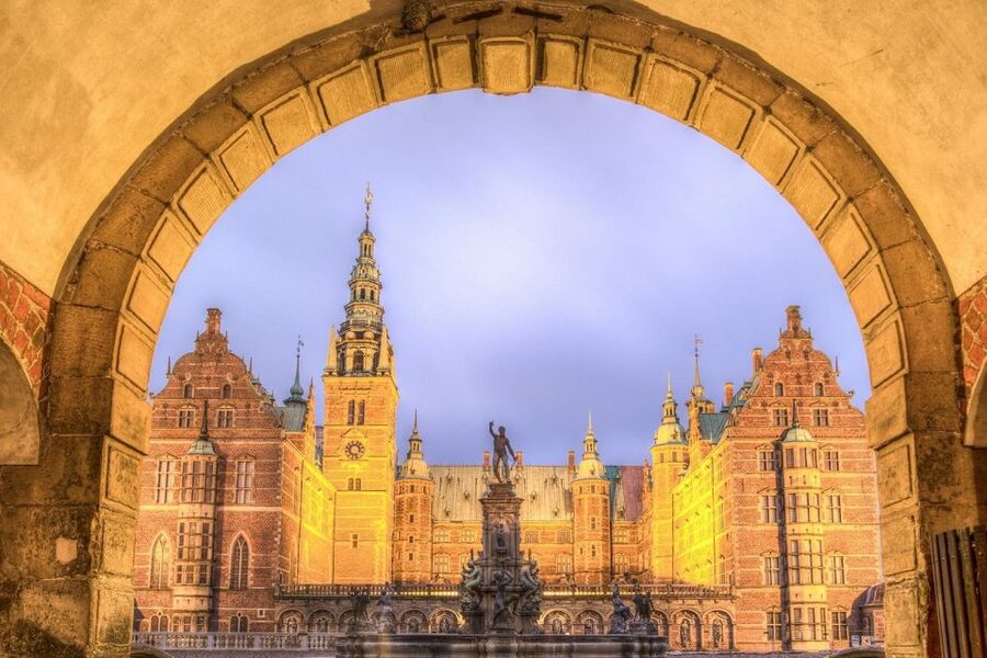 From Copenhagen: Private Frederiksborg Castle Tour - The approach beside the castle lake
