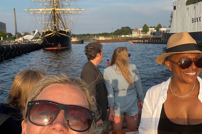 Private Copenhagen Boat cruise in Scandinavian mahogany boat - The Old Stock Exchange and its dragon-tail spire